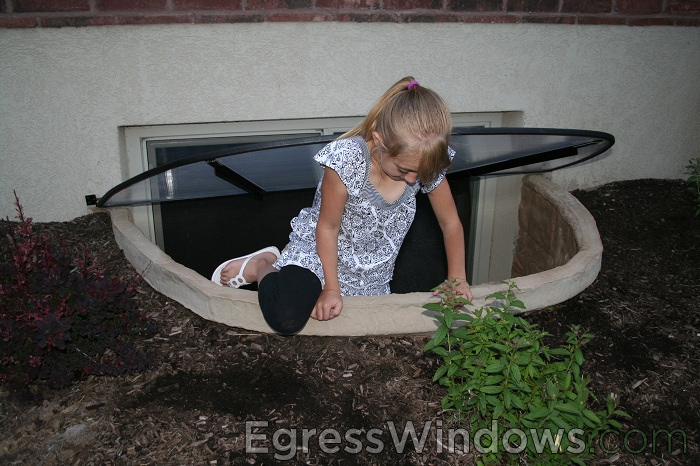 Basement emergency exit window